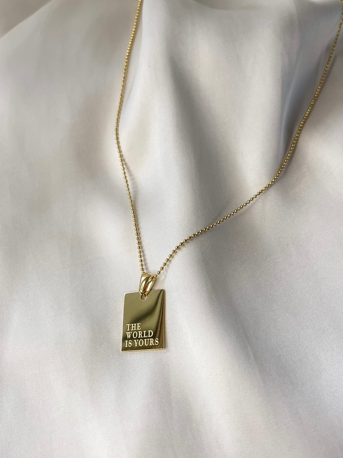 The World is Yours Pendant Necklace